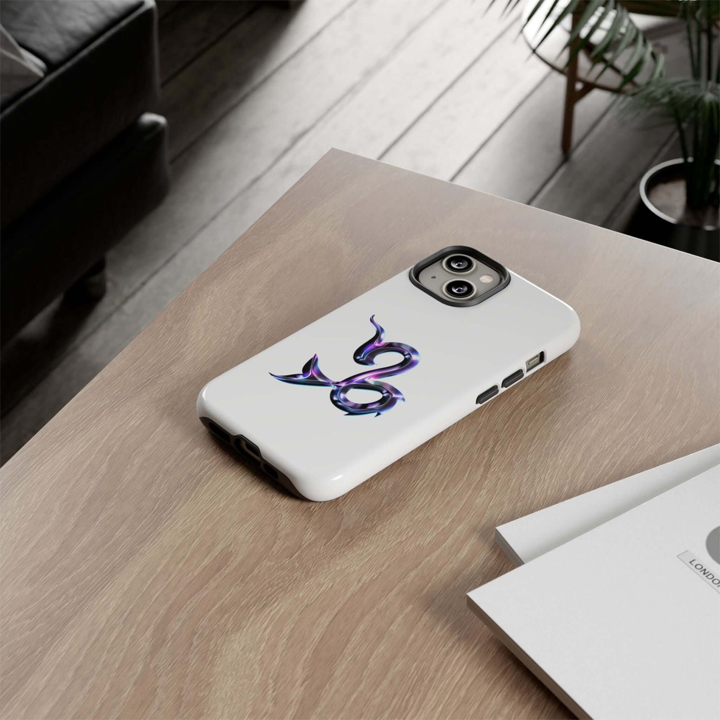 Personalized Zodiac phone case featuring a vibrant Capricorn design on a white background, stylish and protective.