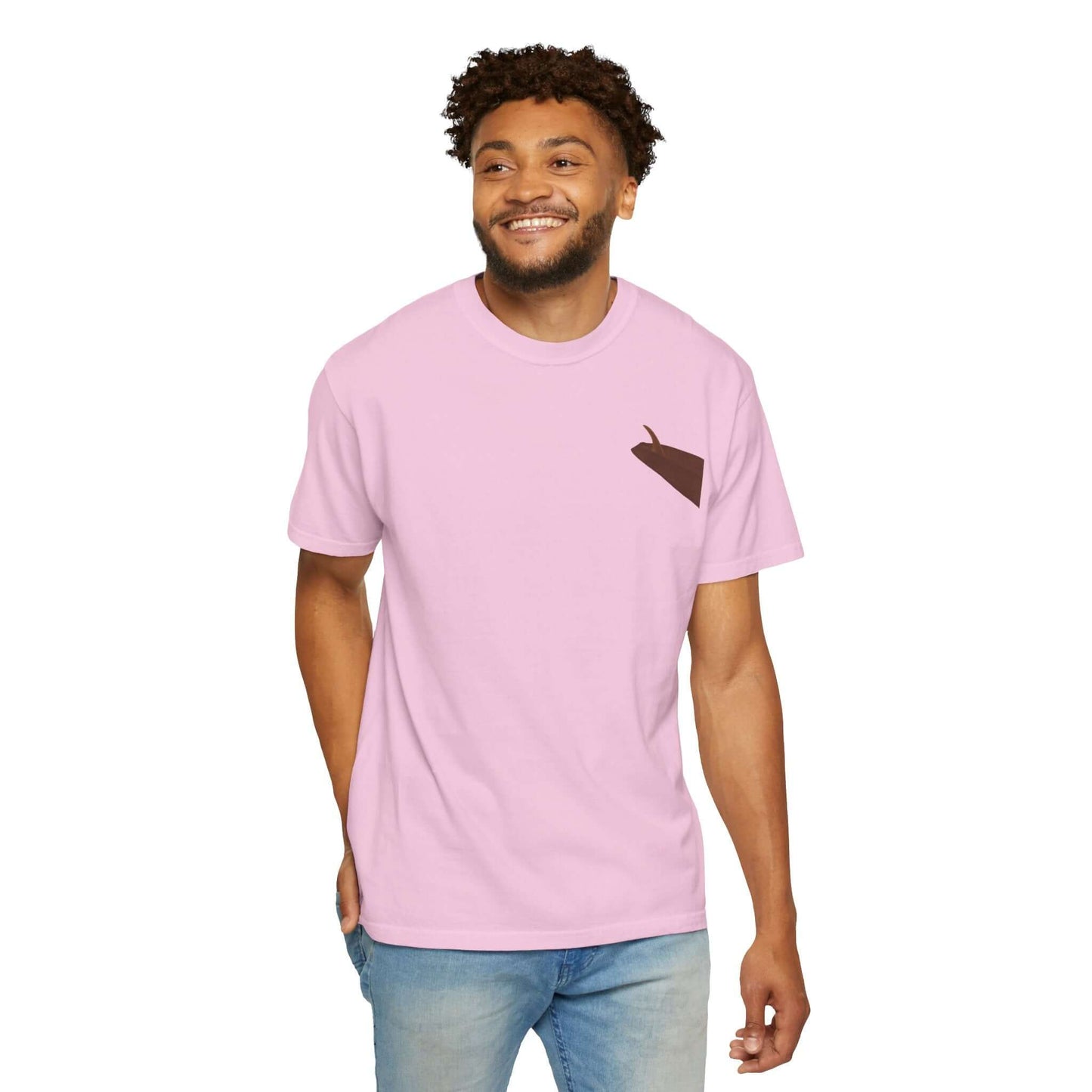 Smiling man wearing a personalized pink Surf's Up t-shirt with a brown surfboard design.