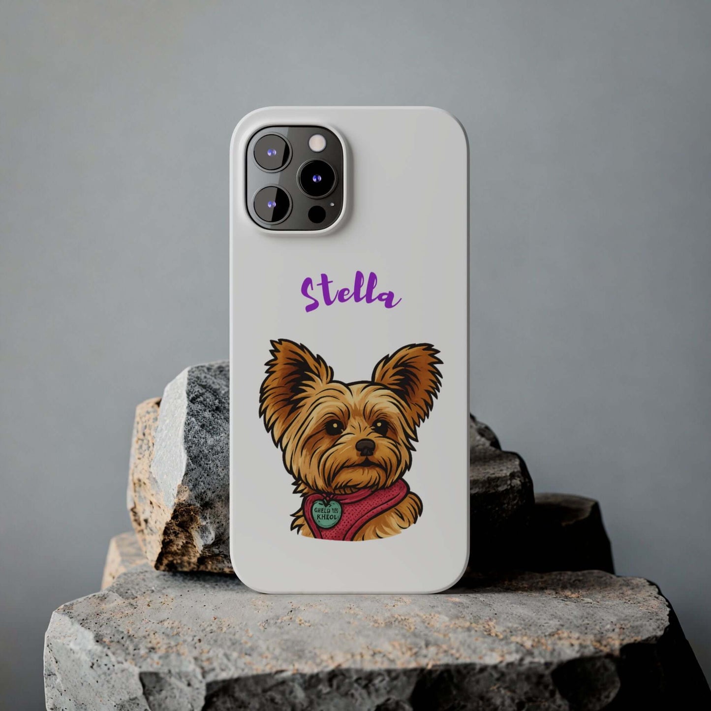 Custom cartoon dog phone case featuring a cute Yorkie named Stella on a durable phone case.