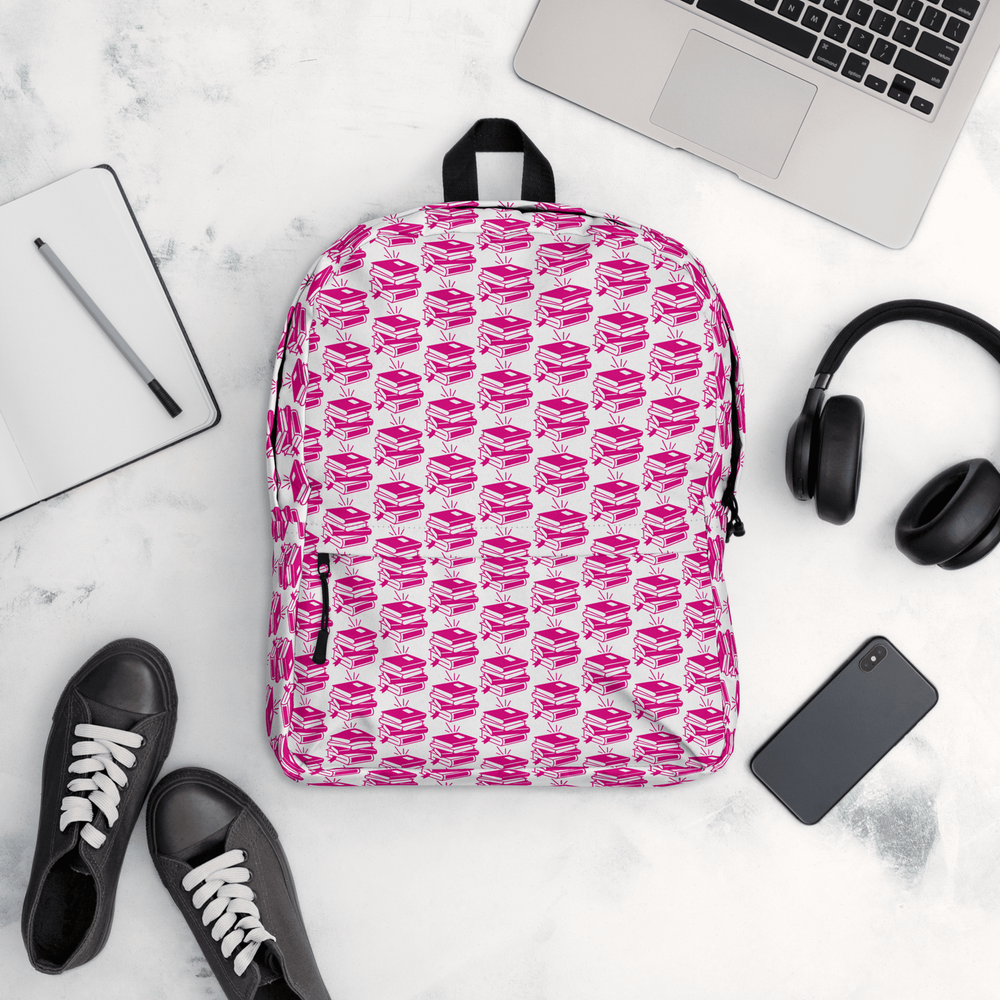 Stylish Pack & Play Backpack in bold pink pattern, perfect for school and sports, with practical features.