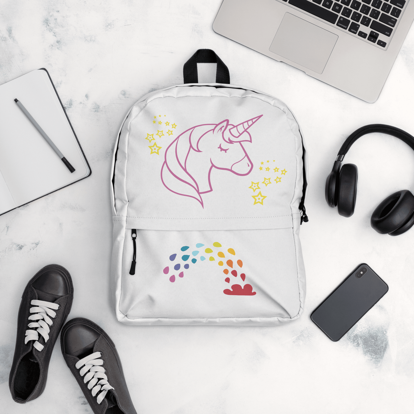 Unicorn Dreams Backpack with rainbow design, water-resistant, perfect for school or adventures.