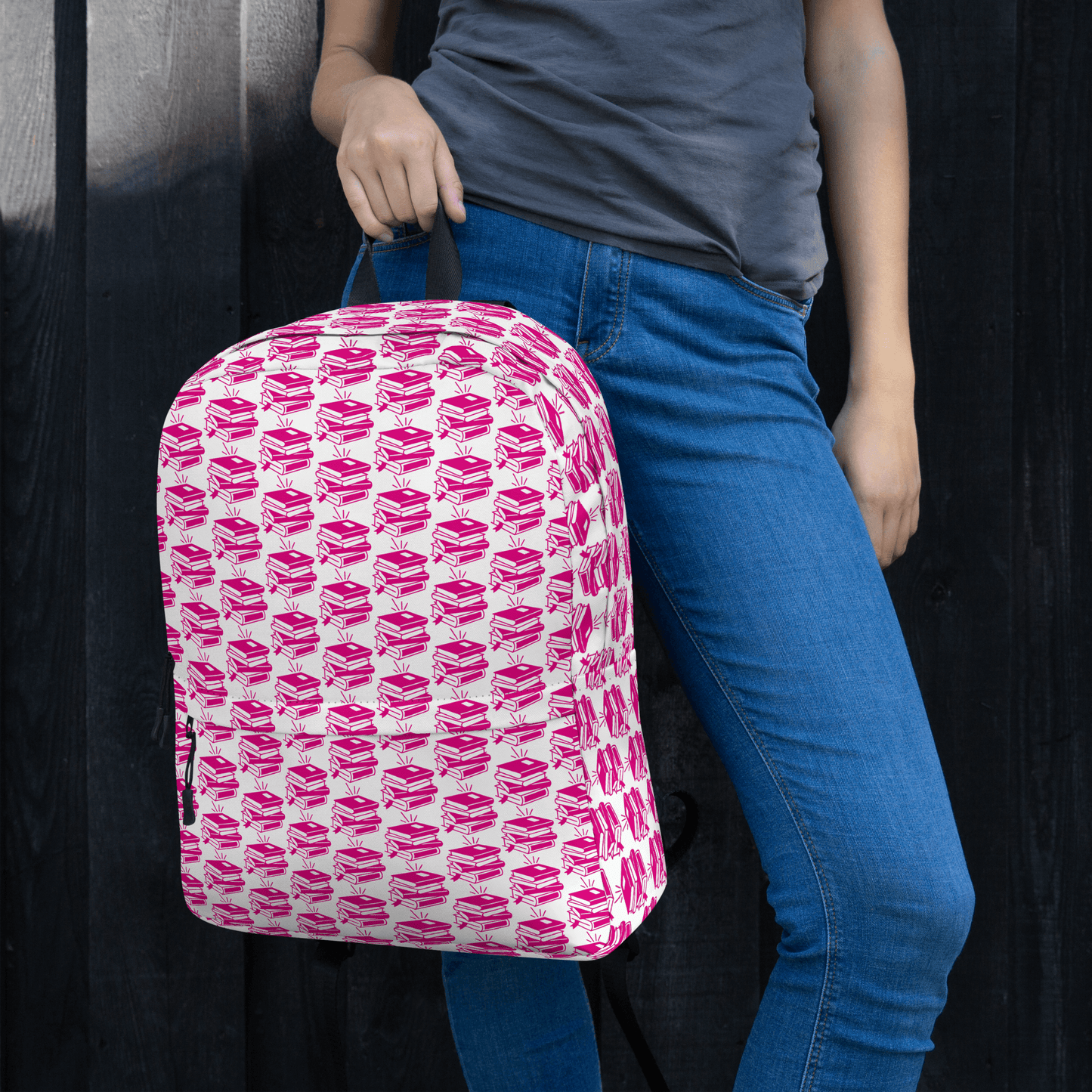 Stylish Pack & Play Backpack with playful pink pattern, perfect for school and adventures, carried comfortably.