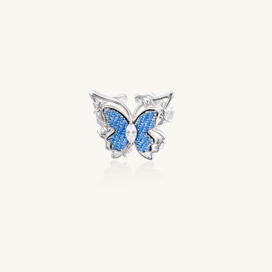 Azure Butterfly Ring with blue textured wings and crystal center, showcasing an elegant 18.8mm wing span.
