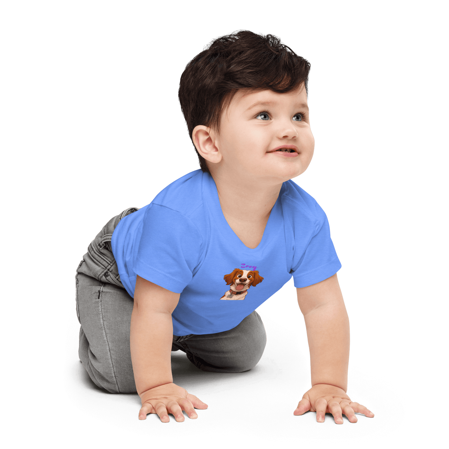 Baby in a blue custom cartoon pet shirt, smiling and crawling, showcasing a unique design with a pet illustration.