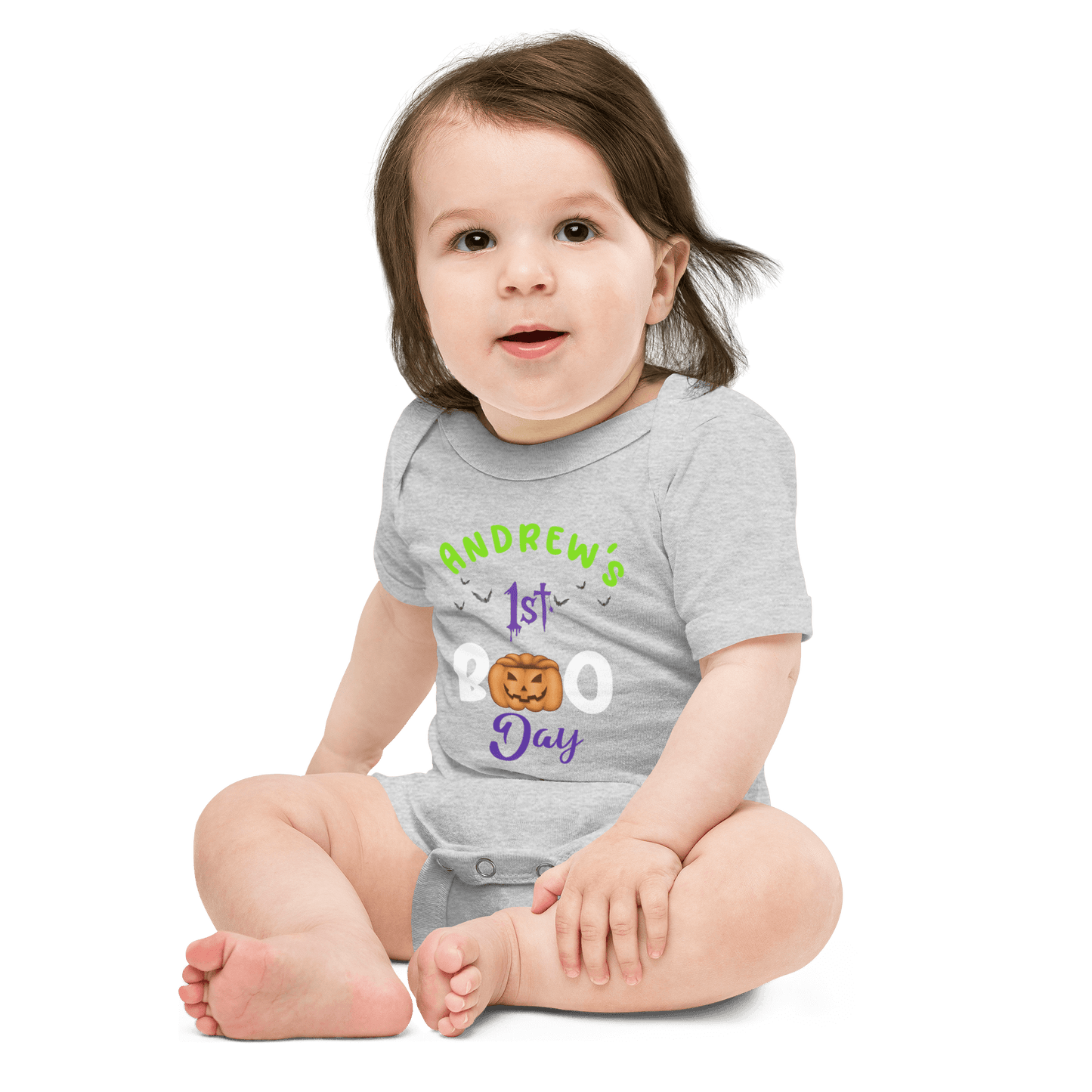 Personalized baby bodysuit for Halloween with festive text and playful pumpkin design.