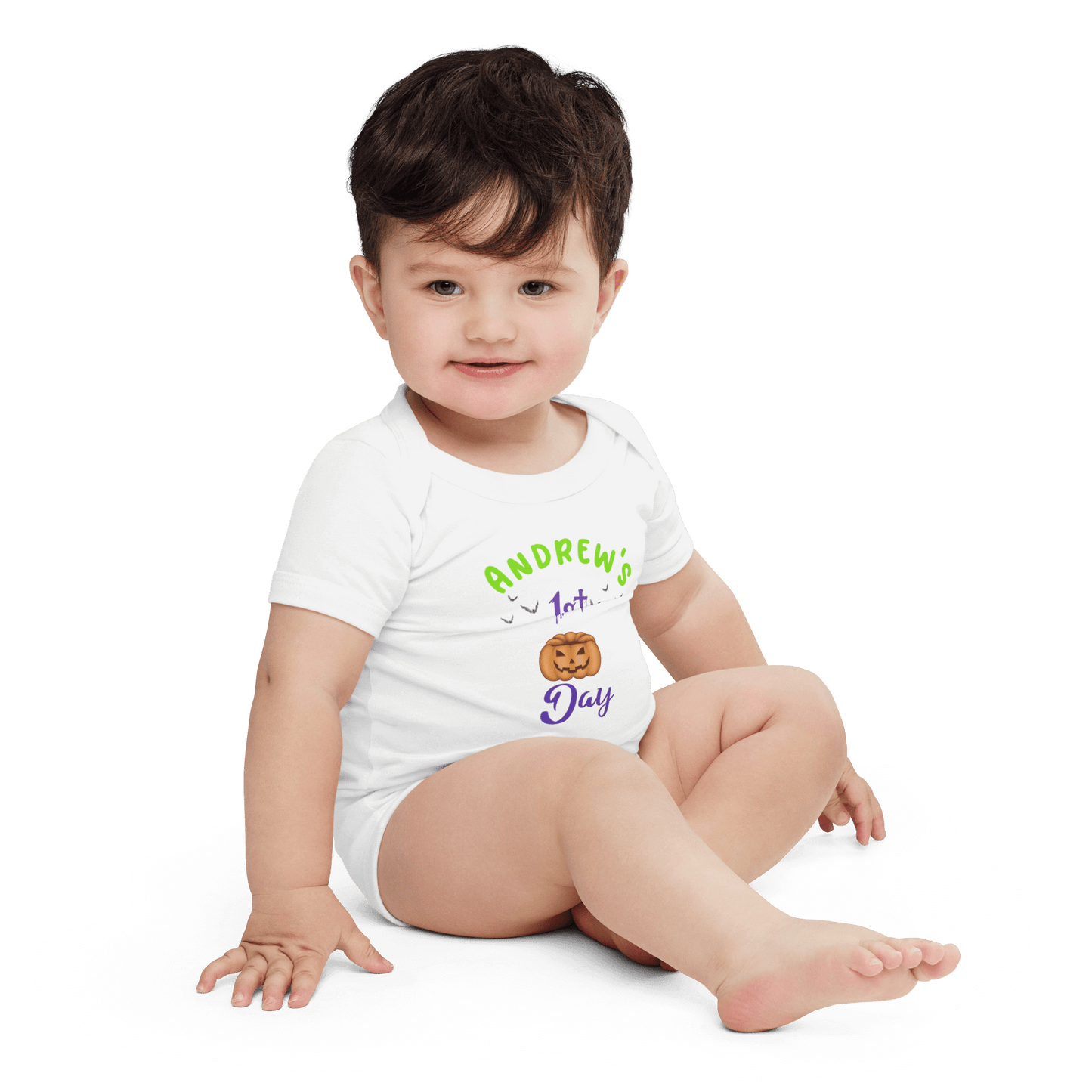 Baby boy wearing a personalized bodysuit for his 1st Halloween with pumpkin design and festive text.