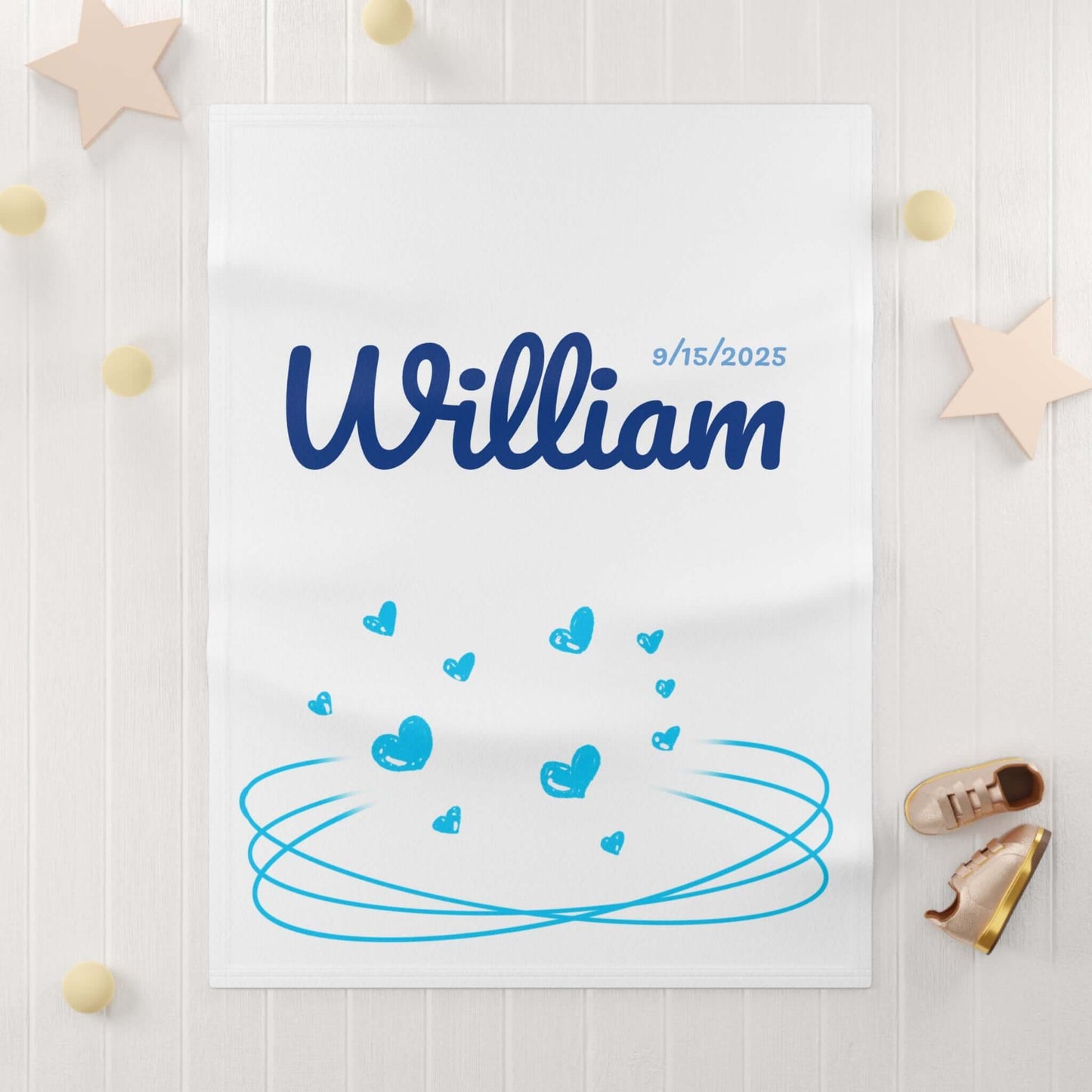 Personalized baby blanket featuring the name William and heart design, perfect for nursery decor and cozy snuggles.