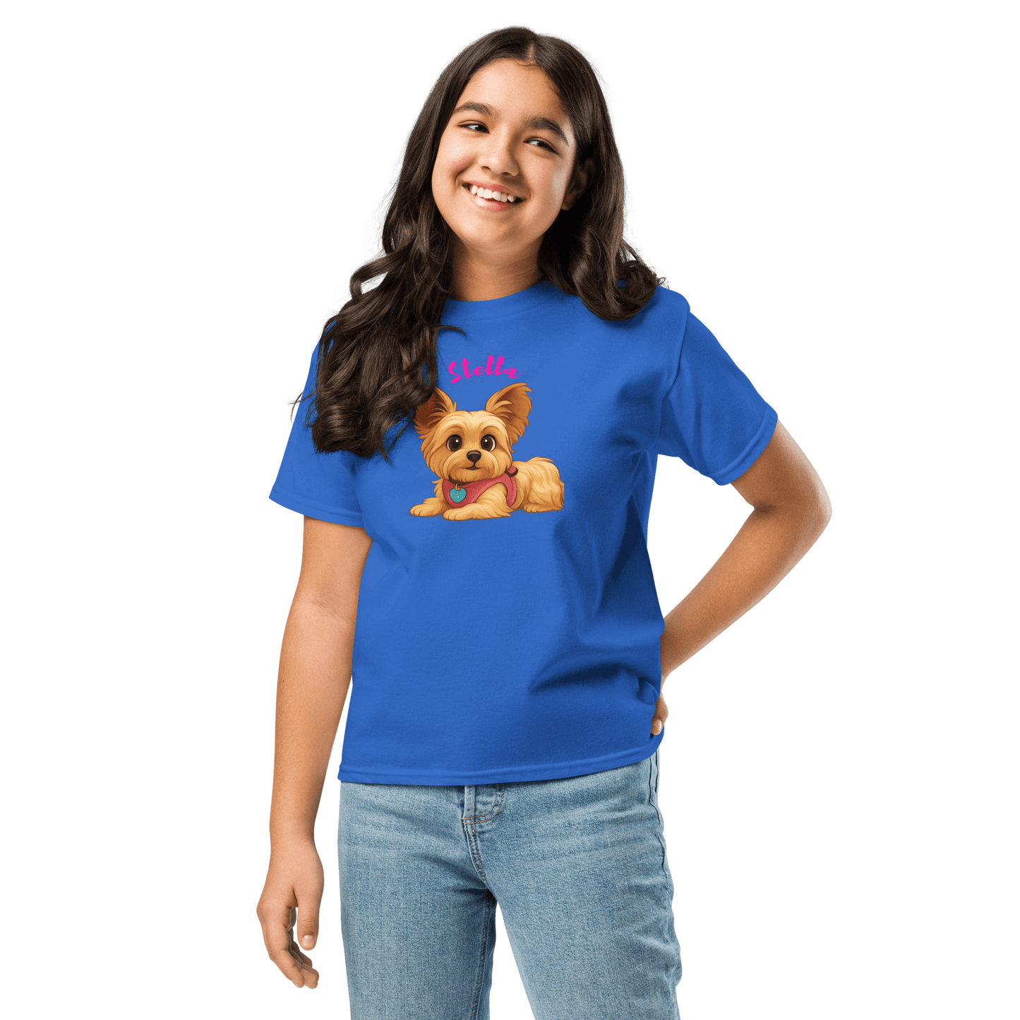 Young girl wearing a blue personalized shirt with a cartoon dog illustration and name Stella, perfect for kids.