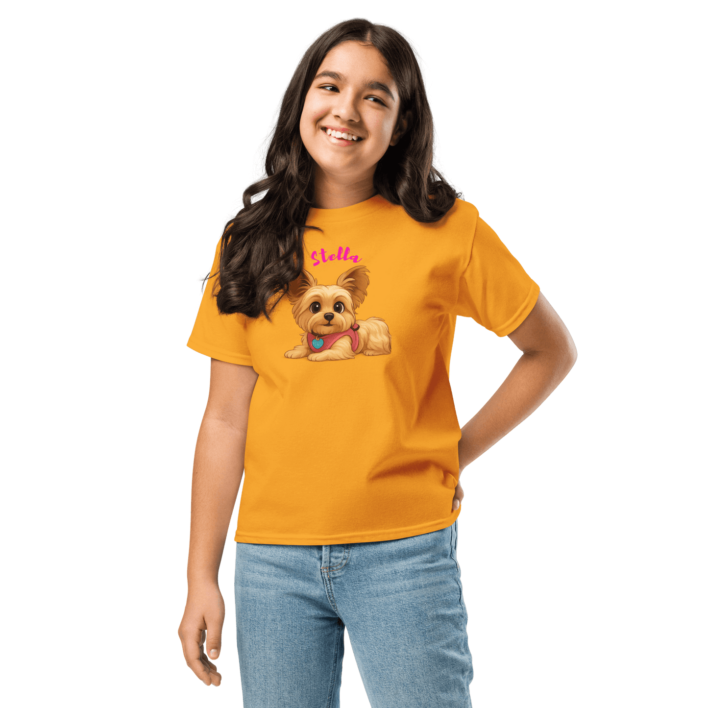Happy child wearing a personalized cartoon pet shirt featuring a cute dog and custom name Stella.