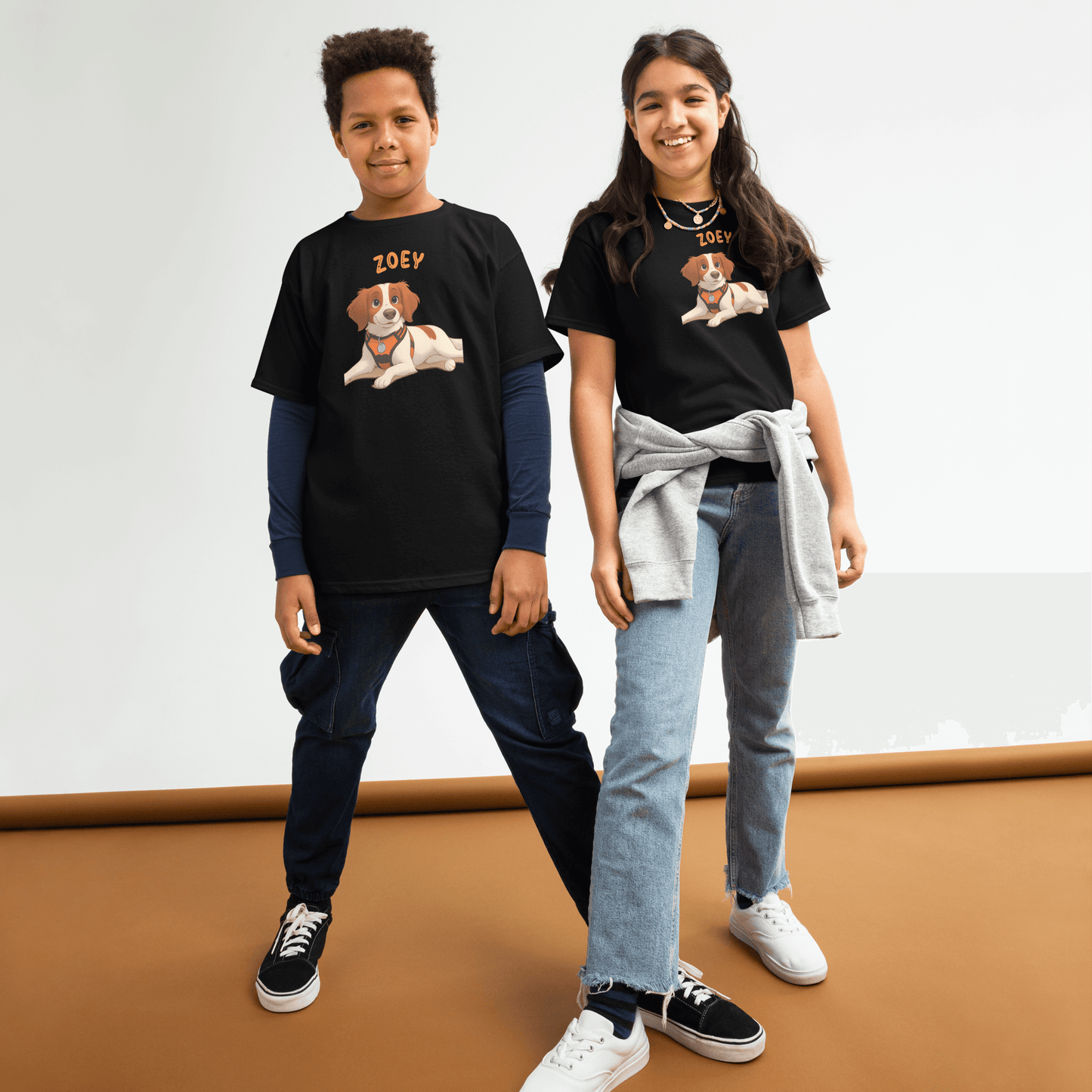 Kids wearing personalized cartoon pet shirts featuring a cute dog illustration and the name 'Zoey'.