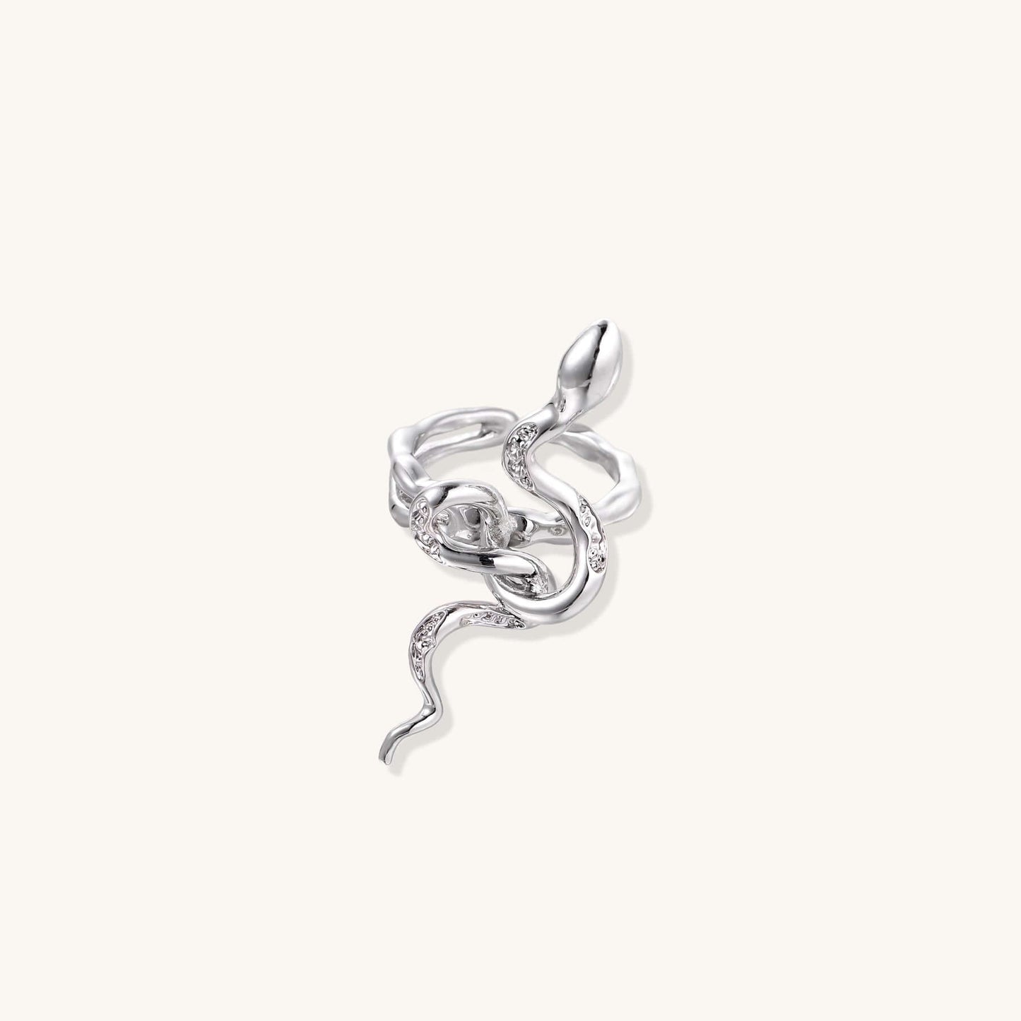 Elegant Serpent Flow Ring featuring a sculptural silver design with sparkling crystal accents.