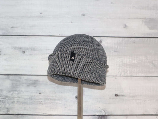 Image of Toddler Acrylic Cuff Hat – Soft Knit Beanie on display, showcasing its cozy knit design and cuff.