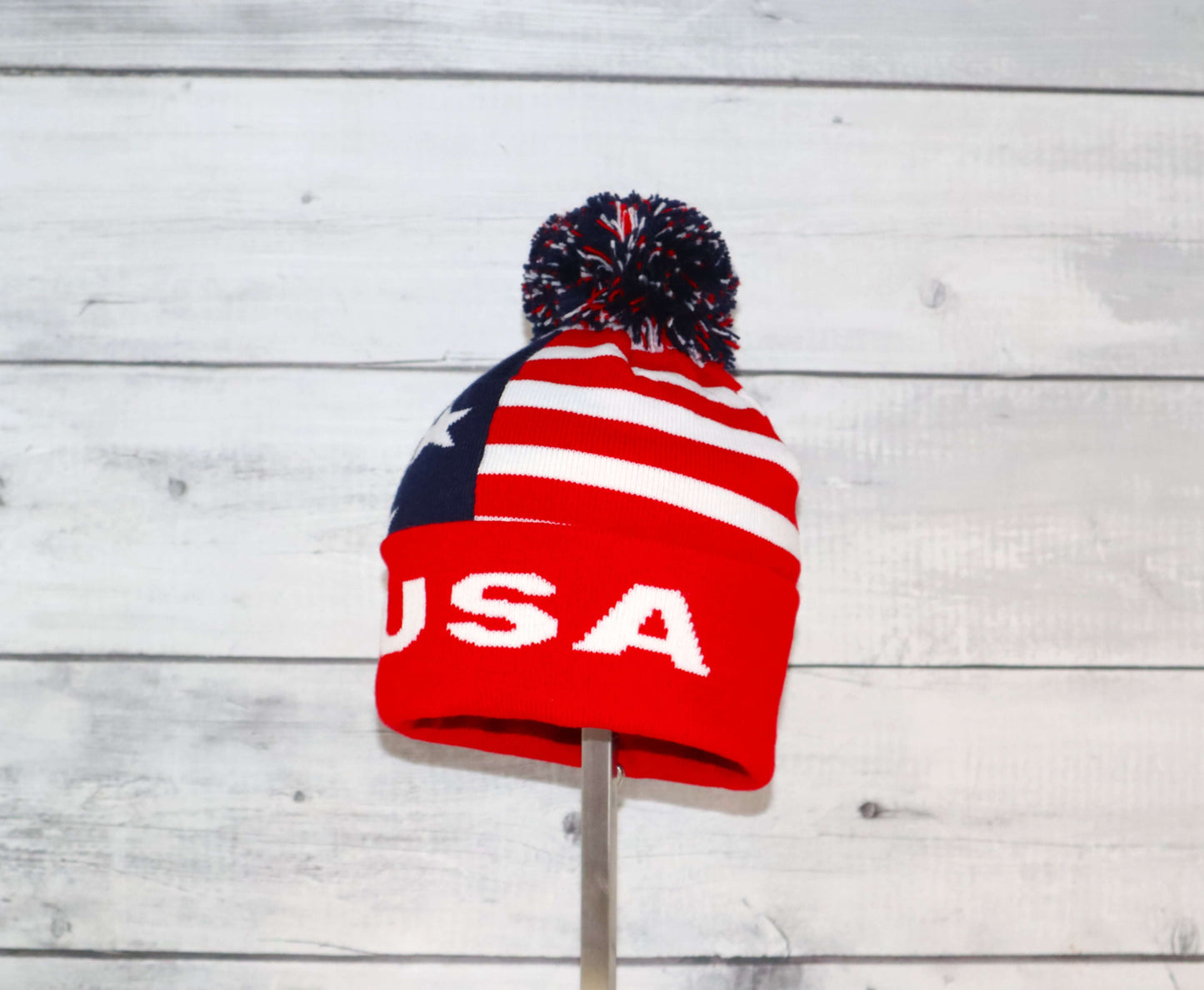 Toddler Specialty Hat – Animal-Inspired Warmth with Purpose, featuring a playful USA design and pom-pom detail.