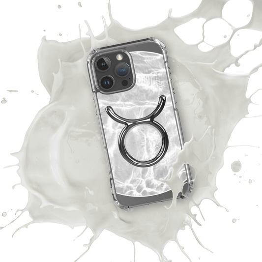 Zodiac Taurus Magsafe clear iPhone case with metallic design over marble, splashed in milk for cosmic style.