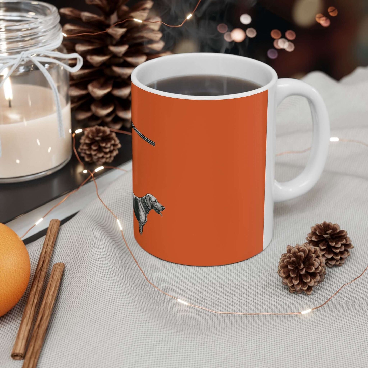 Personalized orange hunting mug with dog's silhouette, perfect for outdoor enthusiasts and coffee lovers.