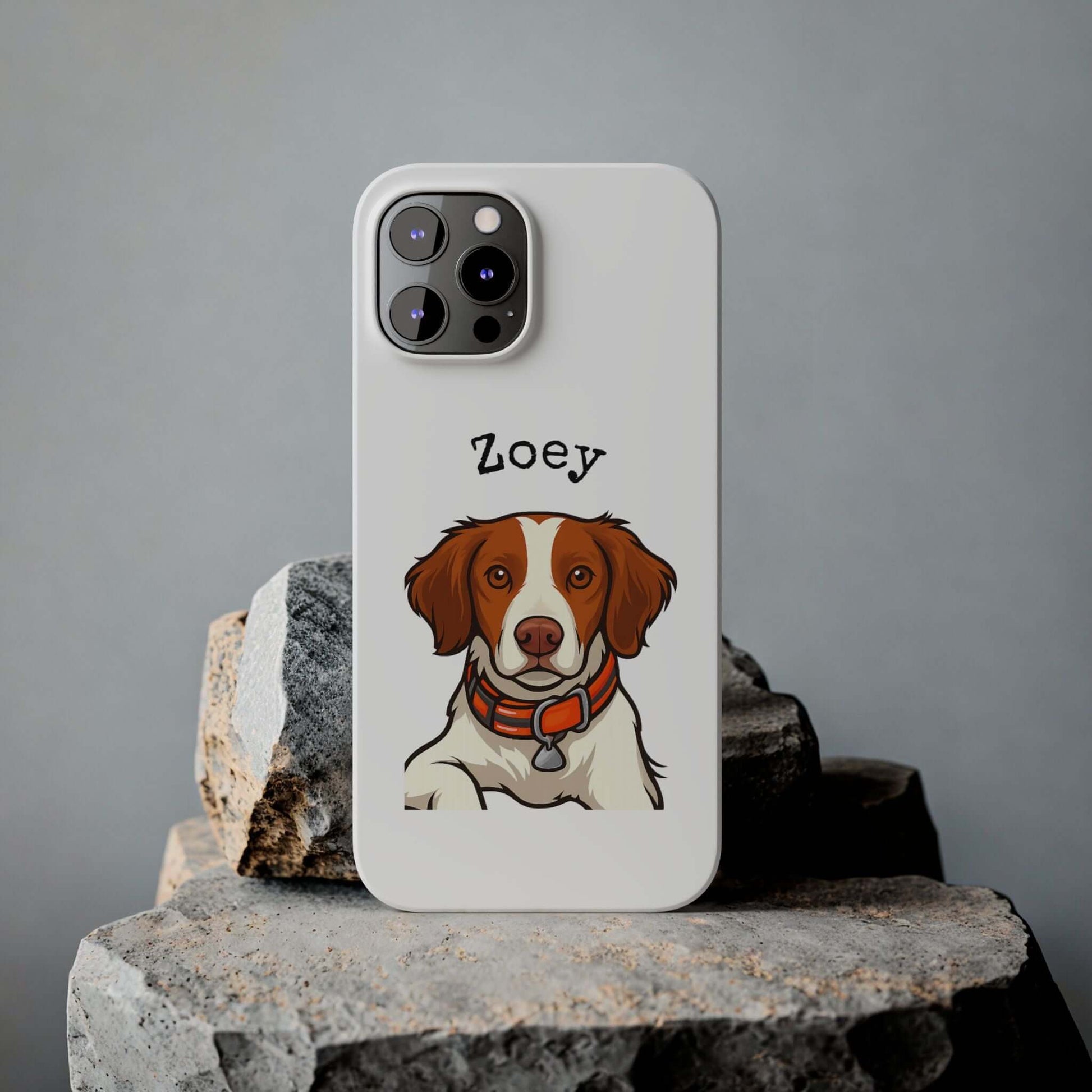 Custom cartoon dog phone case featuring a stylish illustration of a dog named Zoey on a sleek white background.