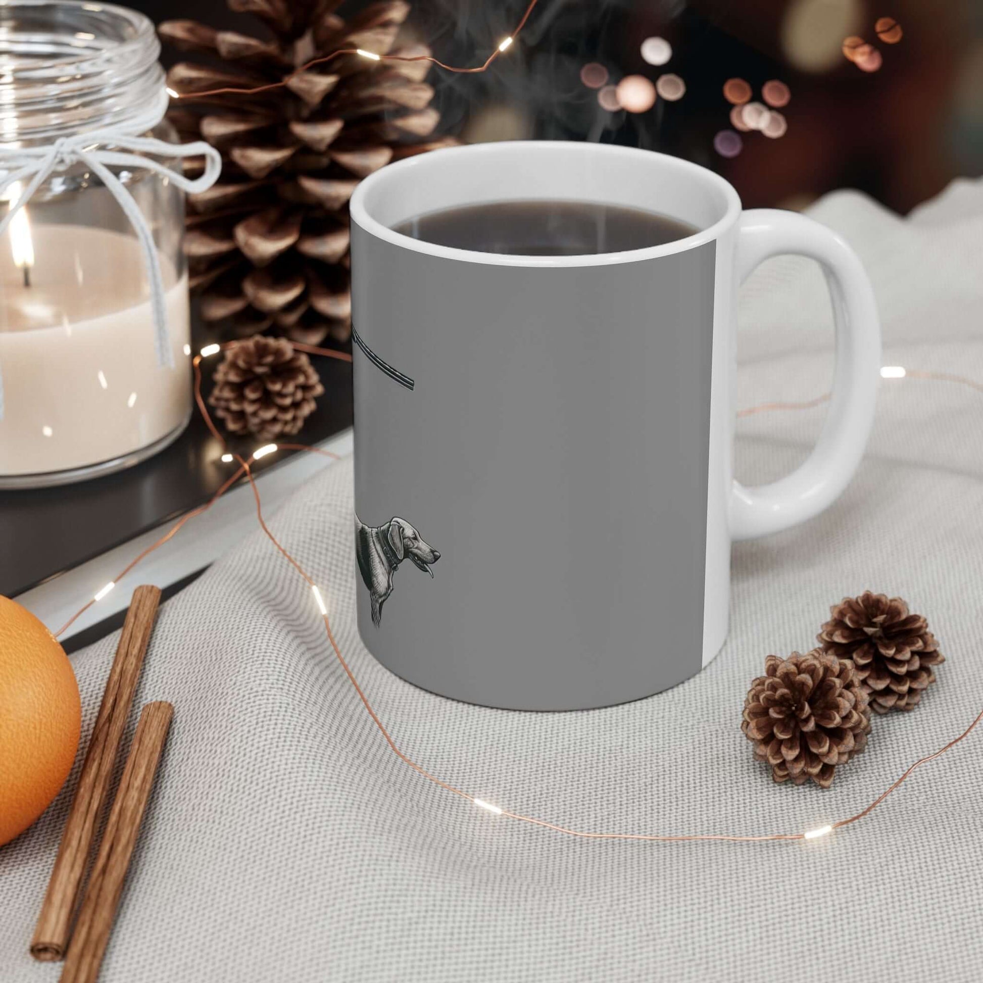 Personalized gray hunting mug on a cozy table, perfect for coffee lovers and outdoor enthusiasts.