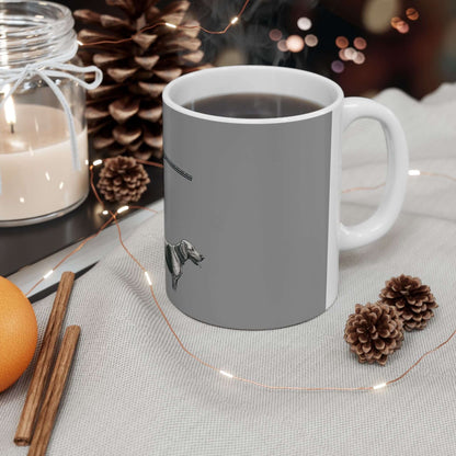 Personalized gray hunting mug on a cozy table, perfect for coffee lovers and outdoor enthusiasts.