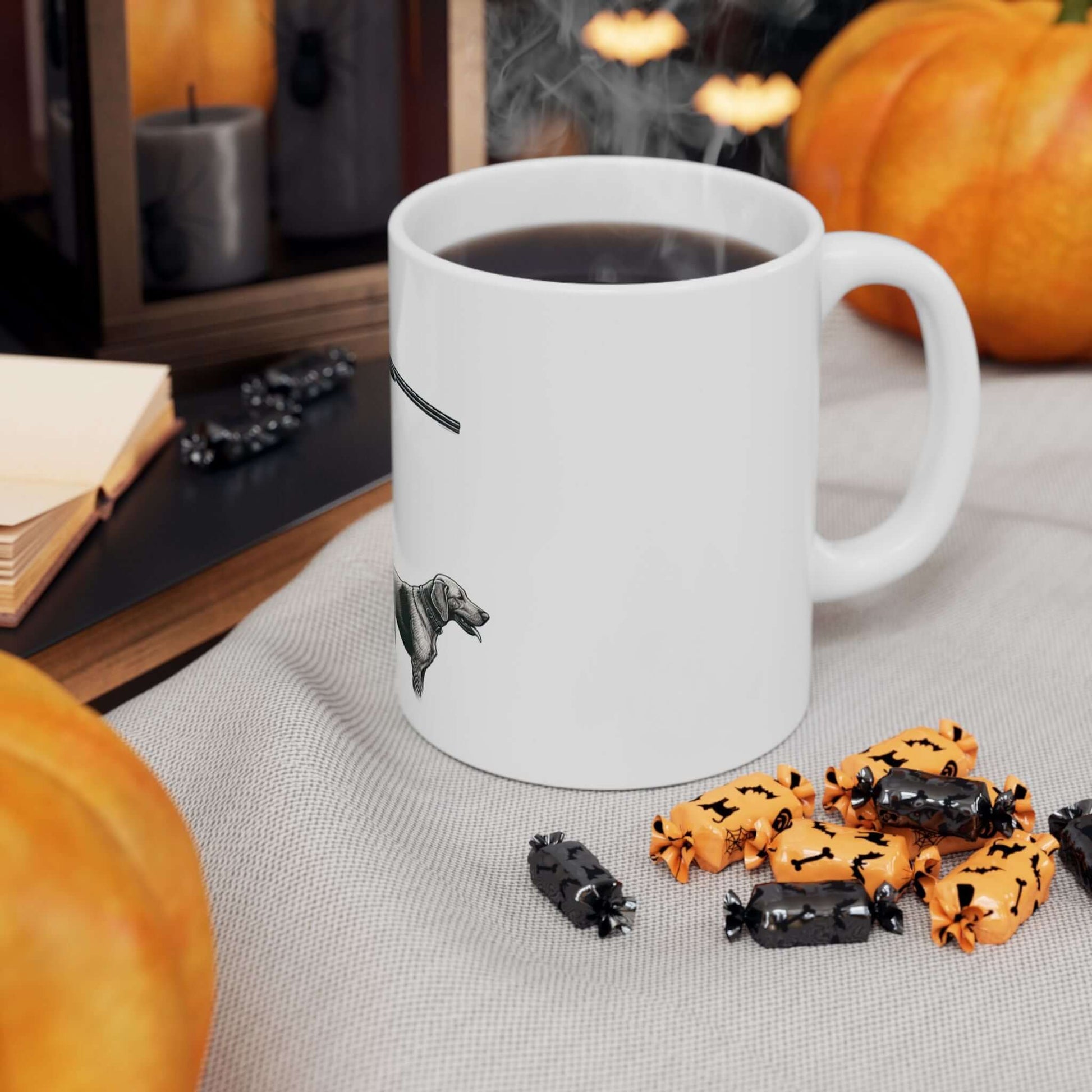 Personalized hunting mug with dog design on table with pumpkins and spooky decorations.