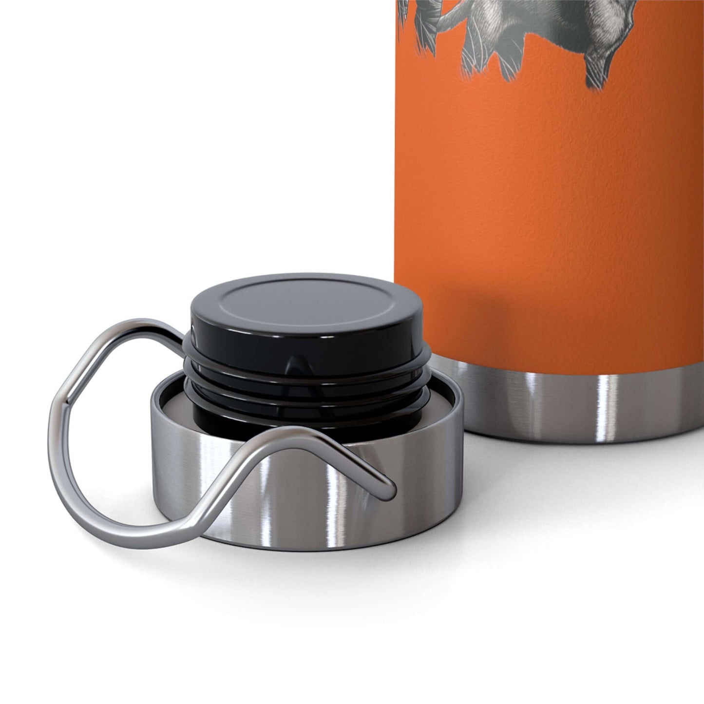 Close-up of the lid and copper base of a personalized copper insulated water bottle for outdoor enthusiasts.