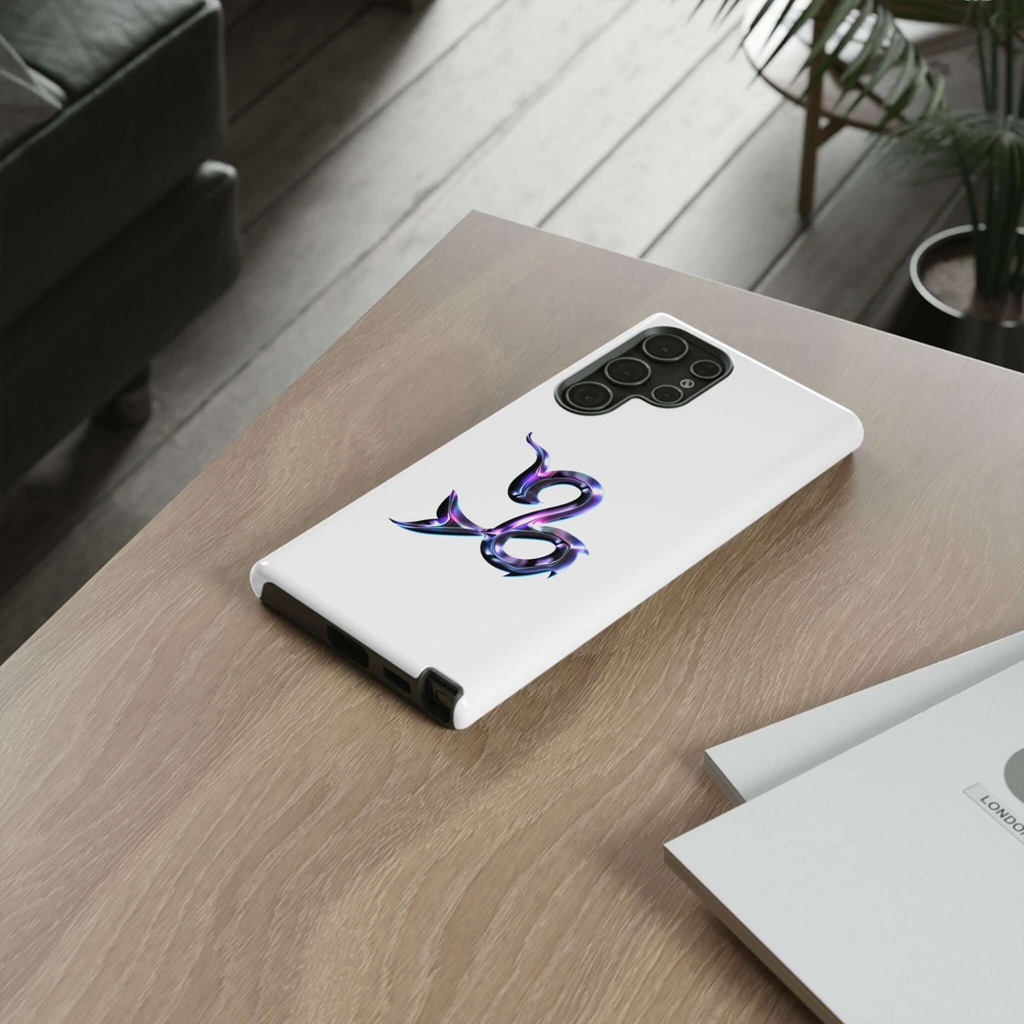 Personalized Zodiac phone case with colorful snake design on a wooden table, perfect for astrology enthusiasts.