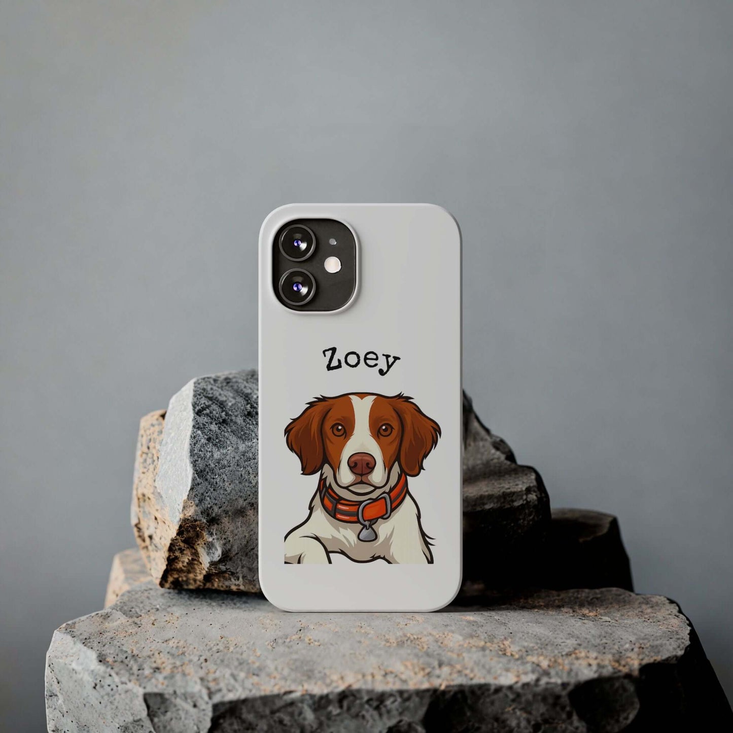 Custom dog cartoon phone case featuring a cartoon of a dog named Zoey on a stylish background.
