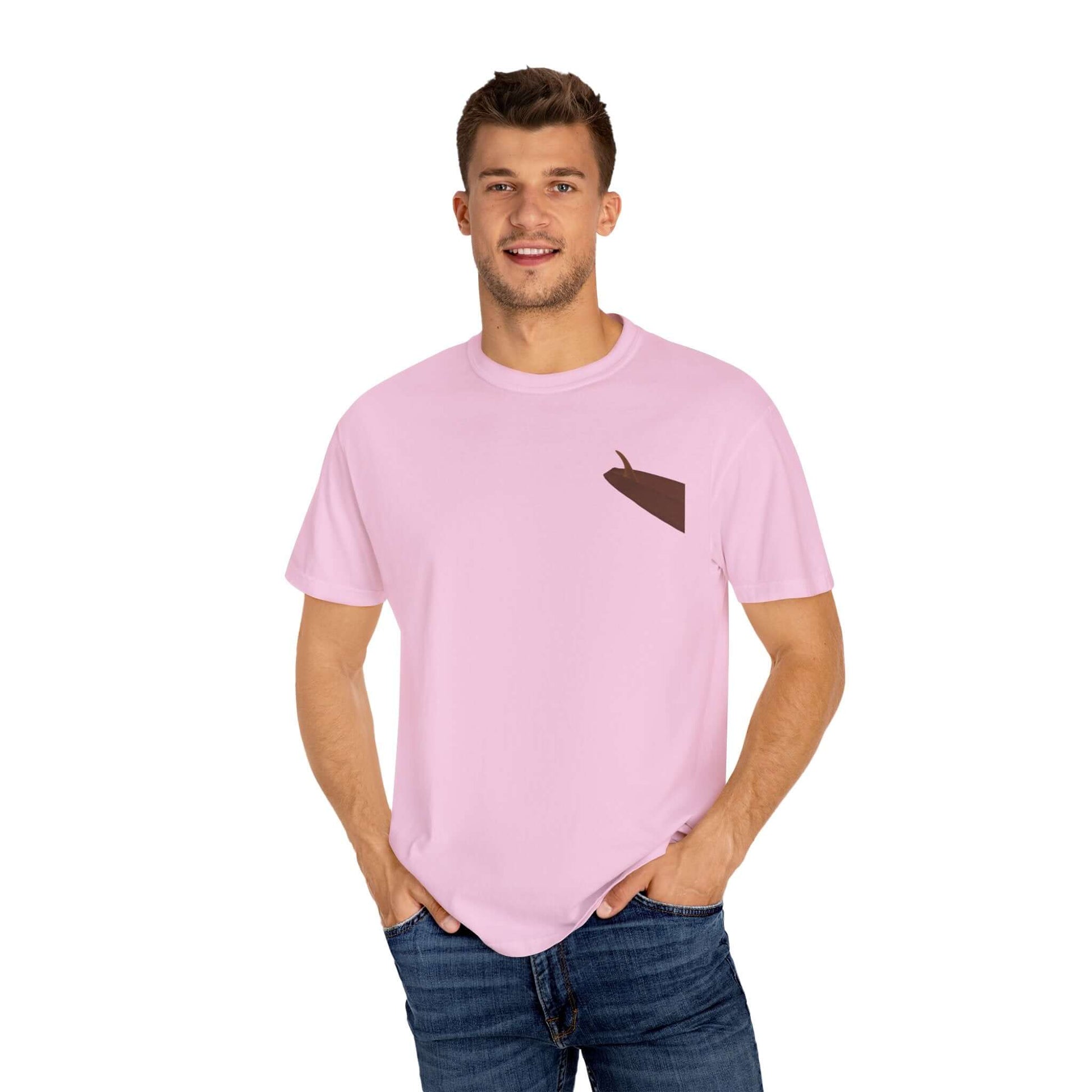 Man wearing a personalized pink surf-inspired t-shirt with a stylish design on the chest.