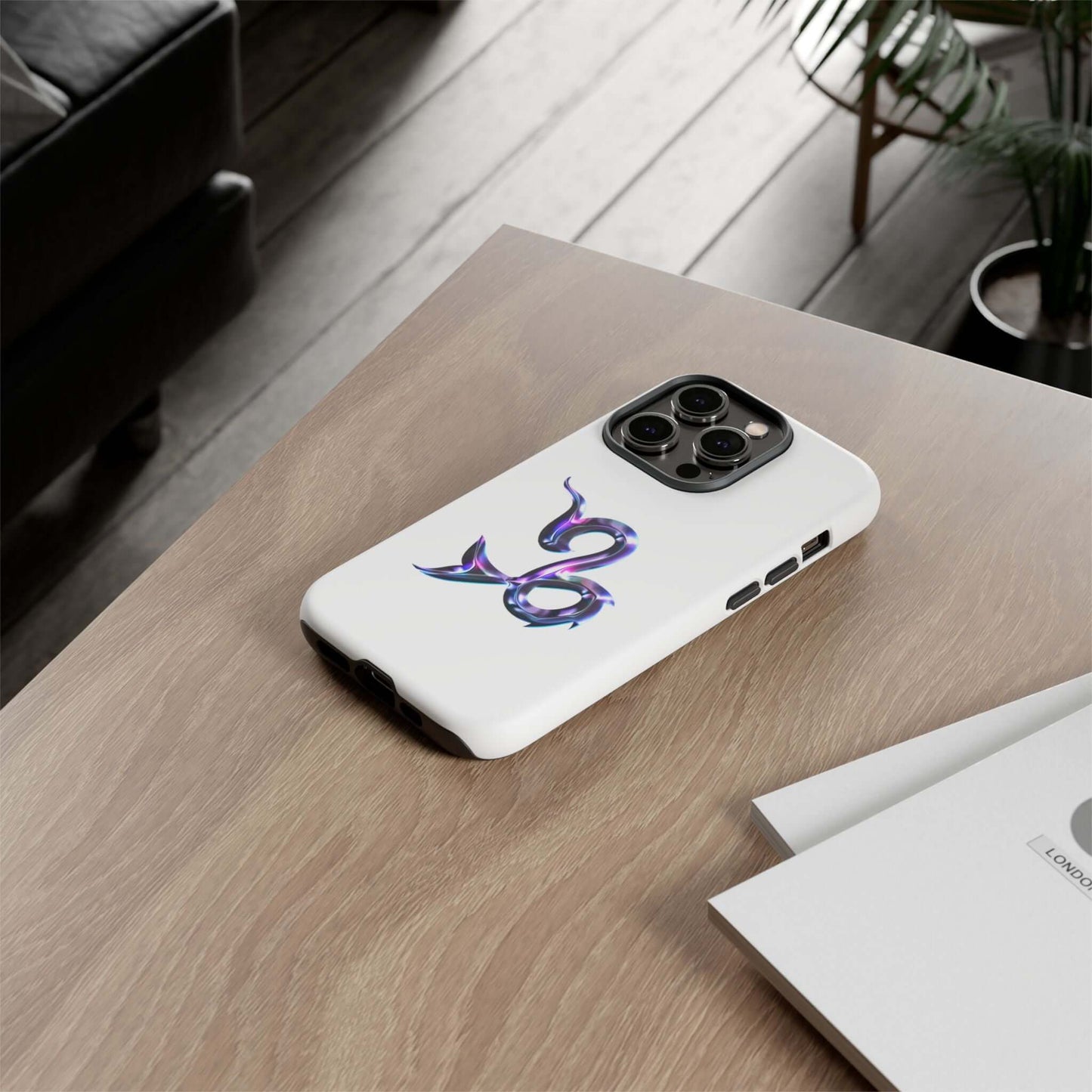 Personalized Zodiac phone case with vibrant purple design on a wooden table, ideal for astrology lovers.