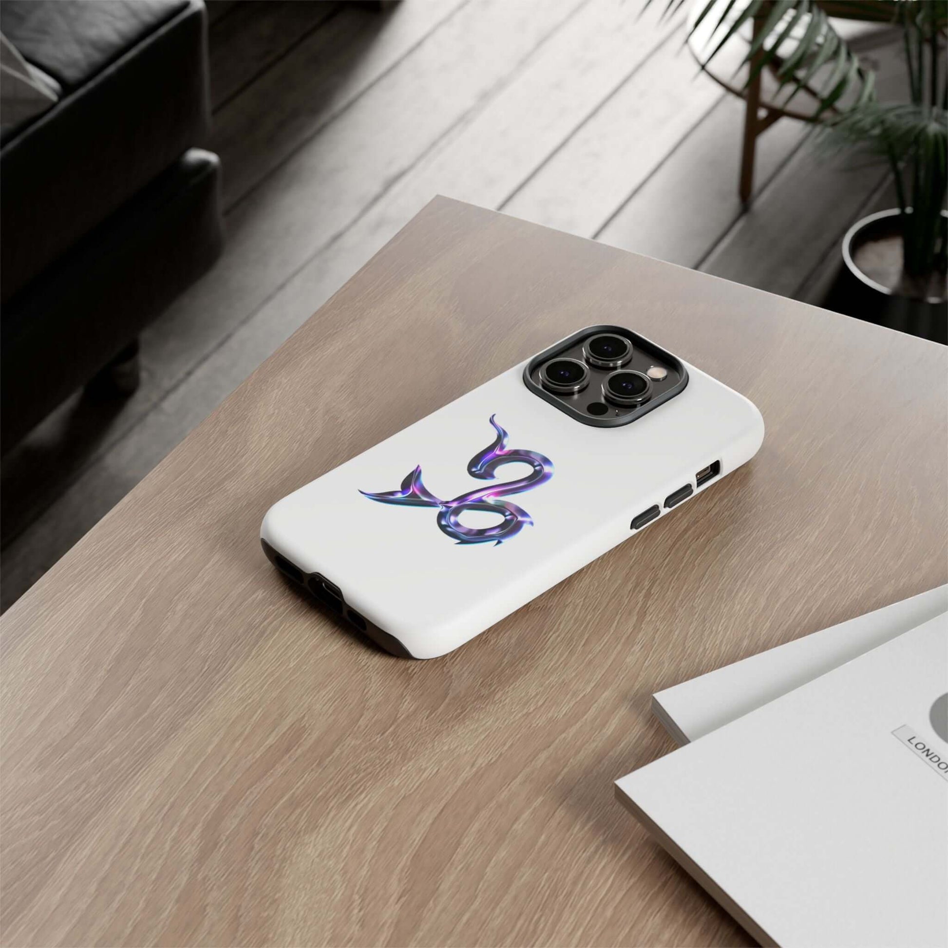 Personalized Zodiac phone case with vibrant purple design on a wooden table, ideal for astrology lovers.
