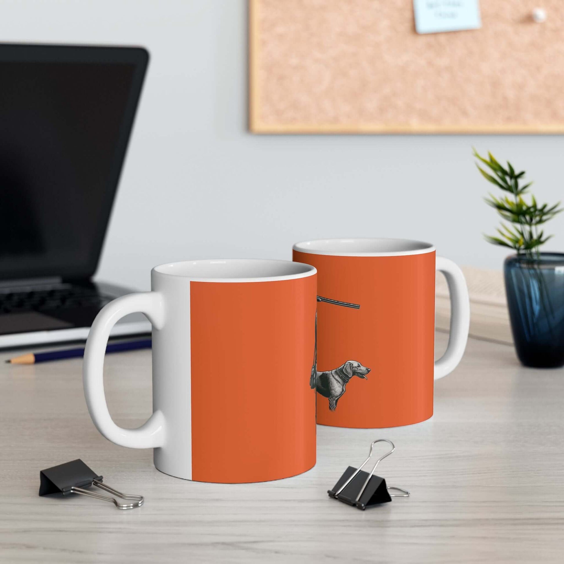 Personalized orange hunting mug featuring a dog design, perfect for coffee lovers and outdoor enthusiasts.