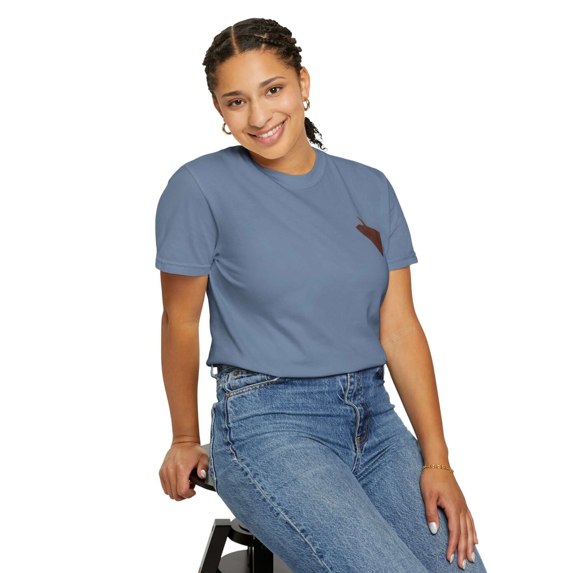 Smiling woman wearing a blue personalized t-shirt with a surf-inspired design, showcasing casual summer style.