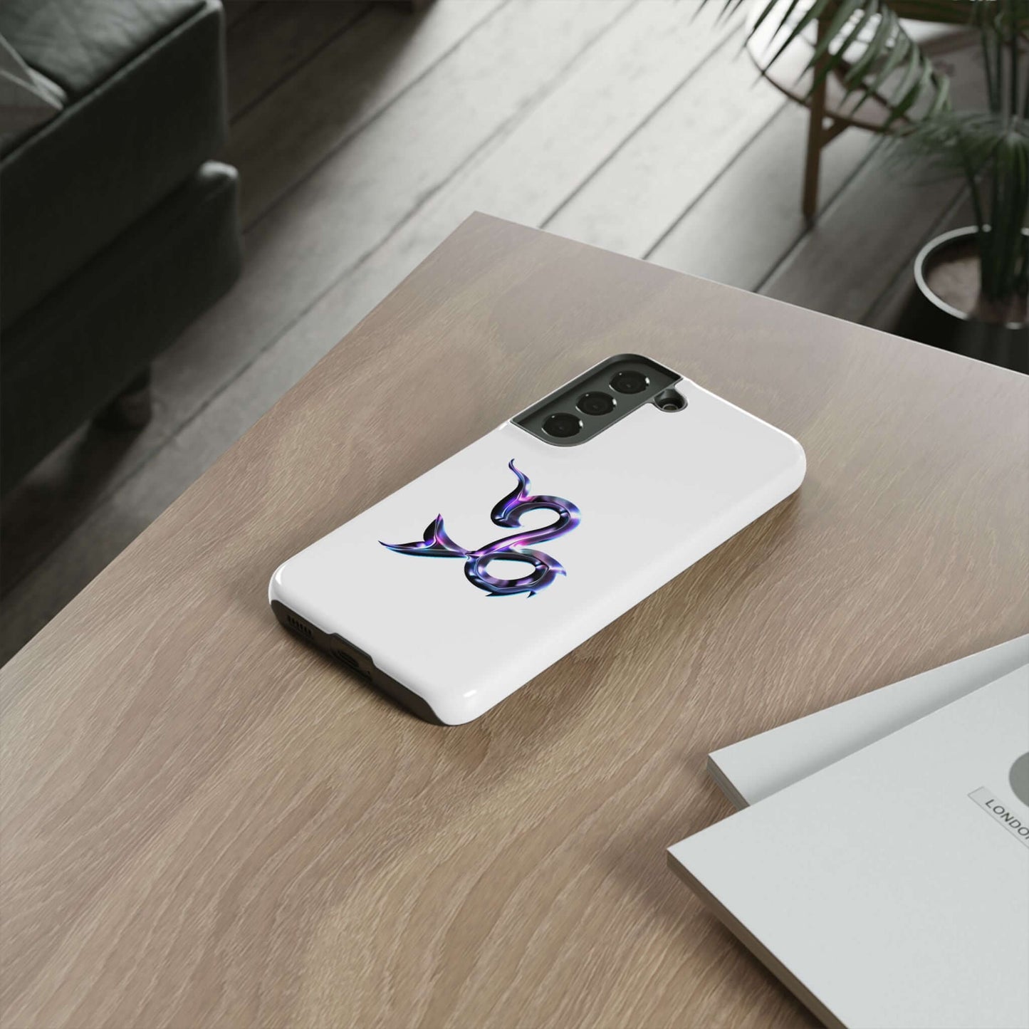 Personalized Zodiac phone case featuring vibrant purple design on a white background, displayed on a wooden table.