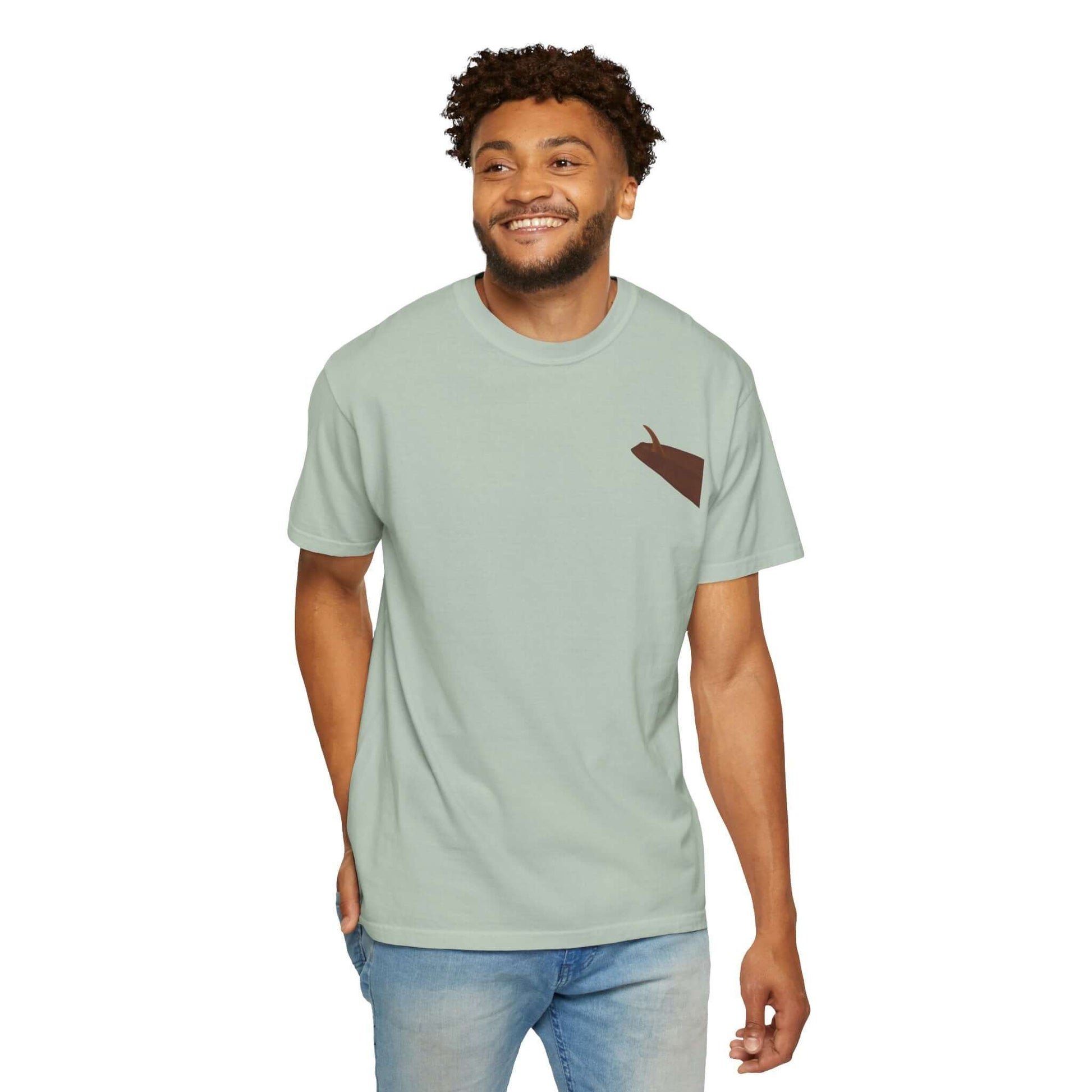 Man wearing a mint green personalized surf-inspired t-shirt with a unique design on the pocket.