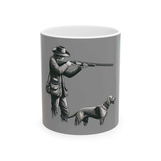 Personalized hunting mug featuring a hunter with a dog on a gray background, ideal for outdoor enthusiasts.