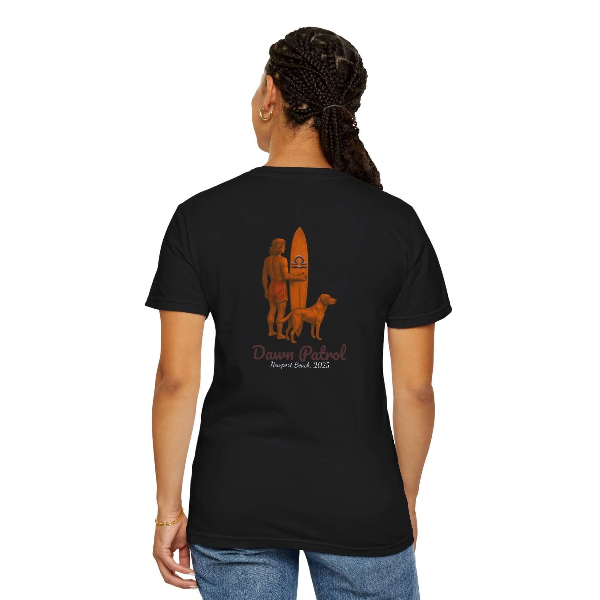 Back view of a black personalized t-shirt featuring a surfer, surfboard, and dog with the phrase 'Dawn Patrol'.