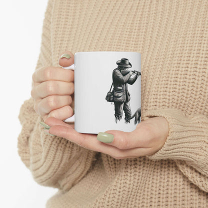 Personalized hunting enthusiast mug held by a person, featuring a stylish hunting design in white.