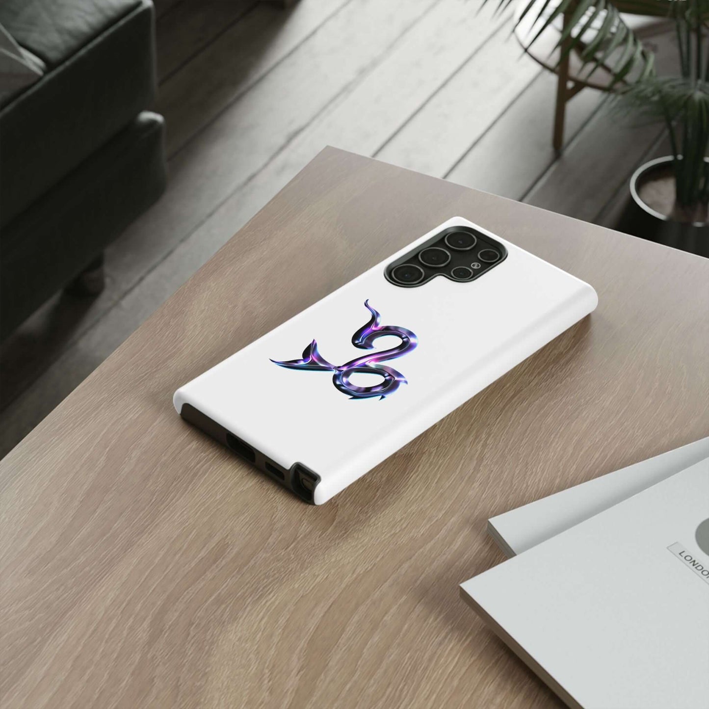 Personalized Zodiac phone case with a vibrant snake design on a wooden surface, perfect for astrology lovers.