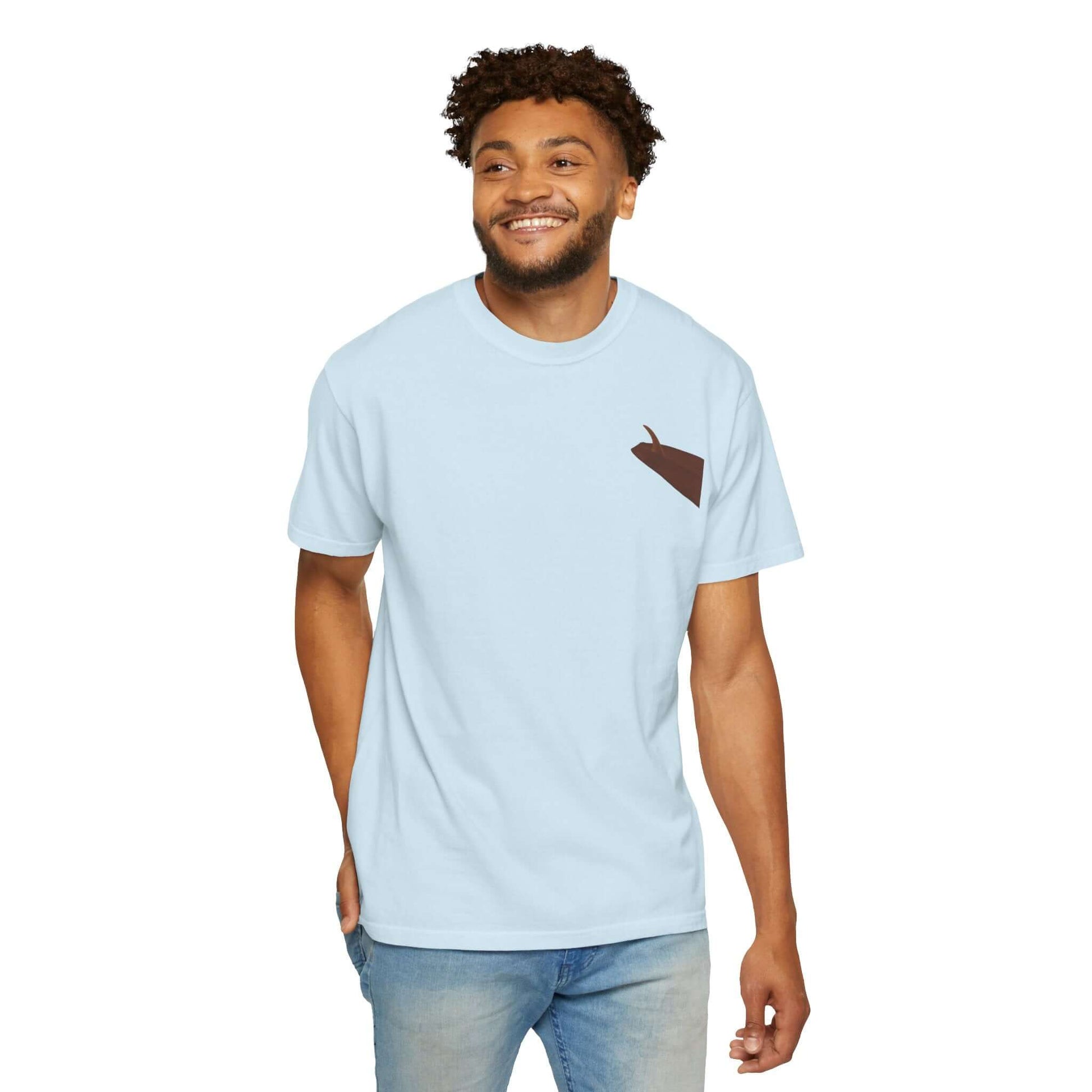 Smiling man wearing a personalized light blue surf-inspired t-shirt with a unique pocket design.