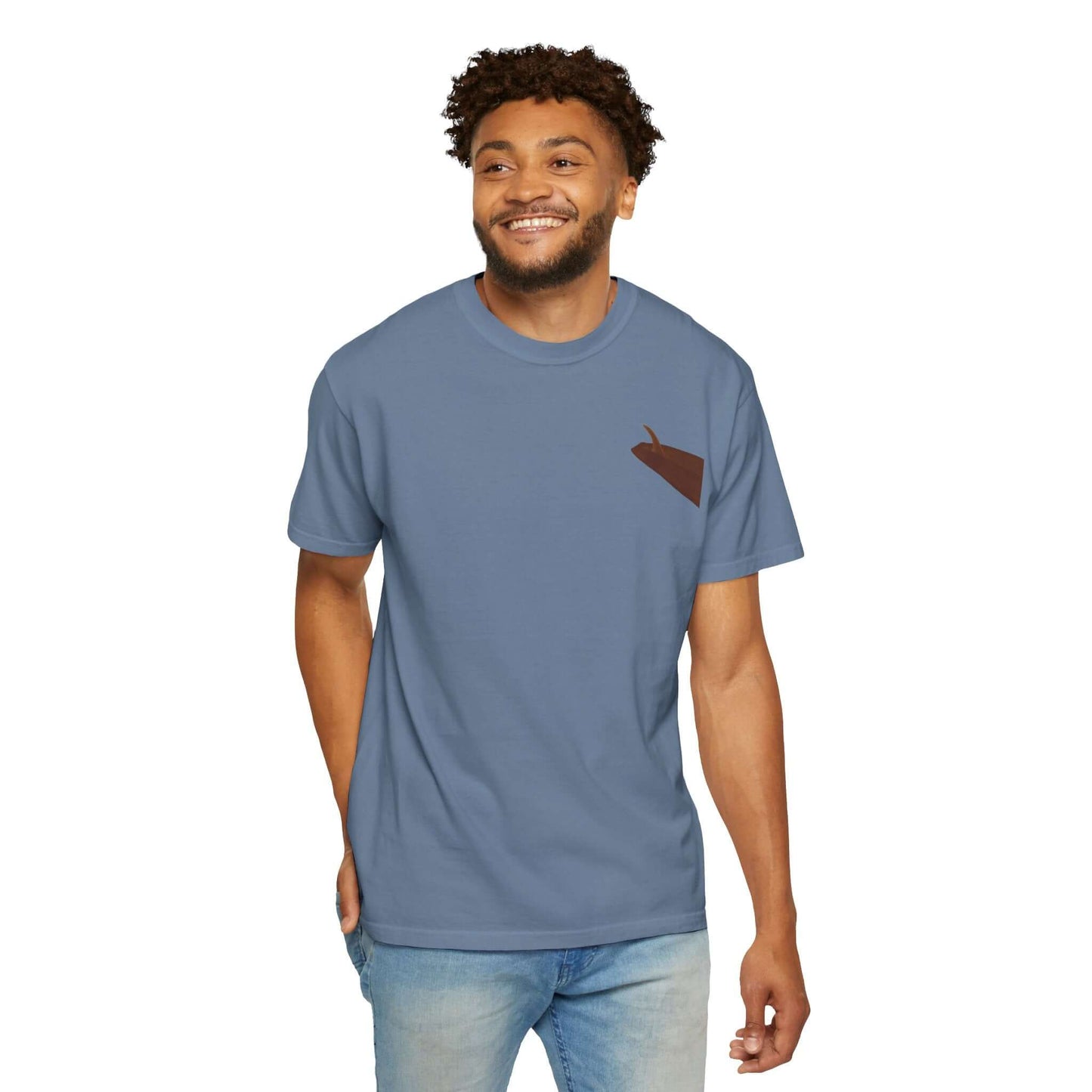 Man wearing a personalized surf-inspired t-shirt in blue with a unique design, smiling and showcasing summer vibes.