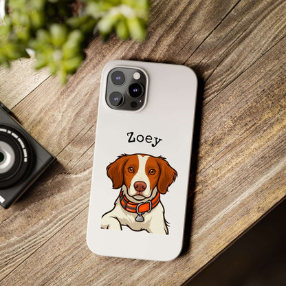 Custom cartoon phone case featuring a dog named Zoey on a wooden table with a camera.