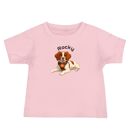 Custom cartoon pet baby shirt featuring a pink tee and an illustration of a dog named Rocky.