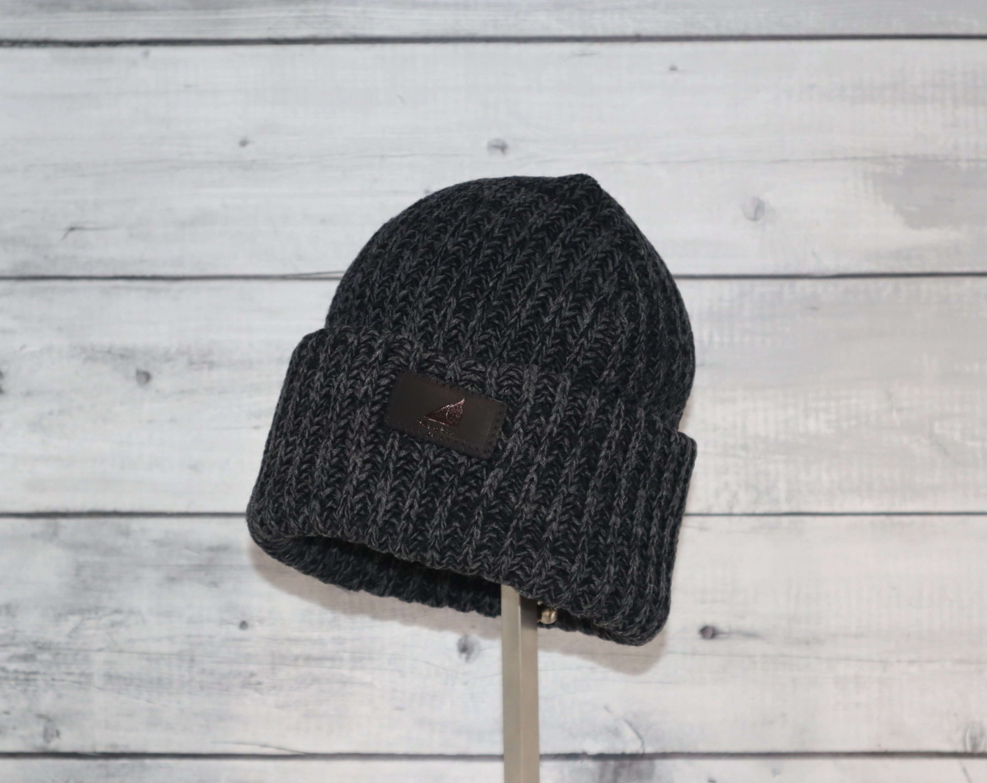 Child Acrylic Ribbed Cuff Hat – Soft, Stretchy & Purposeful in dark gray with ribbed knit texture.