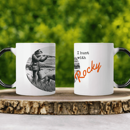 Personalized coffee mugs featuring hunting design and text "I hunt with Rocky" on rustic wood background.