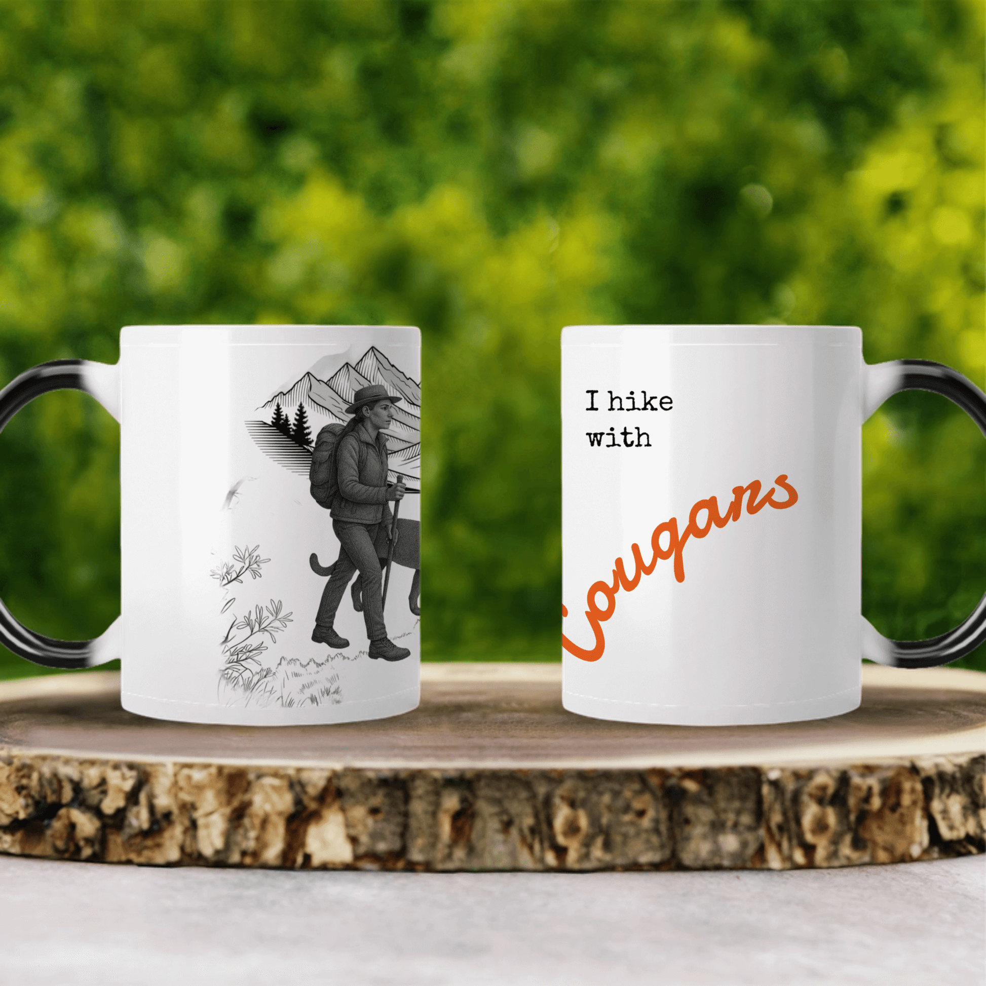 Personalized hiking mugs featuring a nature illustration and fun 'I hike with cougars' text.