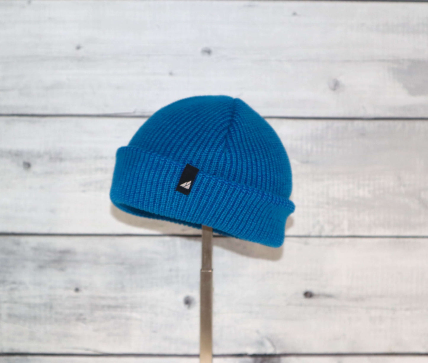 Infant Acrylic Cuff Hat – Soft Knit Beanie for Ages 3–12M in vibrant blue color on display.