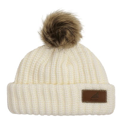 Infant Acrylic Ribbed Cuff with Pom Hat – Cozy & Purposeful in soft cream color with a playful pom pom on top.