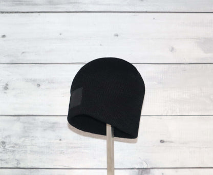 Toddler Acrylic Wool Beanie – Soft, Stretchy & Winter-Ready in black, perfect for winter adventures.