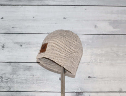Toddler Acrylic Wool Beanie – Soft, Stretchy & Winter-Ready displayed on a wooden background.