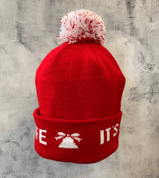 Adult Limited Edition Hat – Bedford Falls Beanie in red with pom-pom and woven designs celebrating It’s a Wonderful Life.