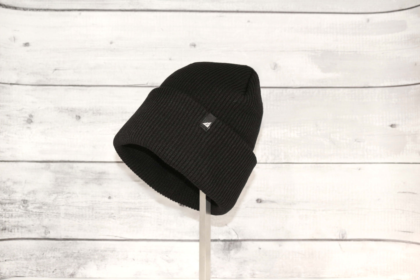 Adult Acrylic Cuff Hat – Soft Knit Beanie in black, showcasing a comfortable and stylish design for cold weather.